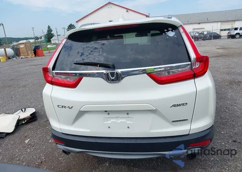 2018 Honda Cr-V Touring z USA, uszkodzony, nr VIN 2HKRW2H91JH665241
